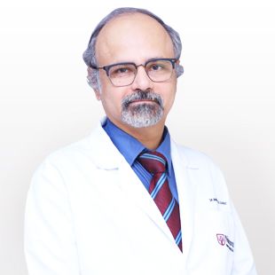 Dr. Manmohan Kamat